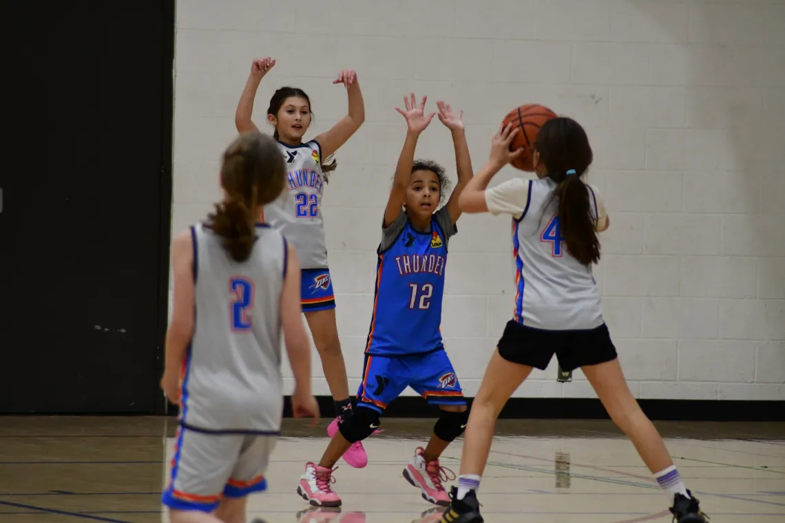 Girls Playing Thunder Basketball